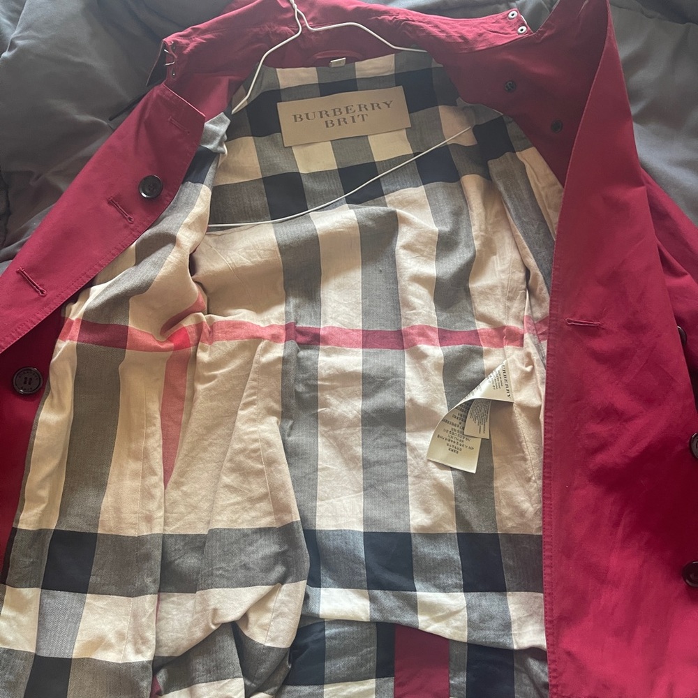 Red Burberry trench coat
